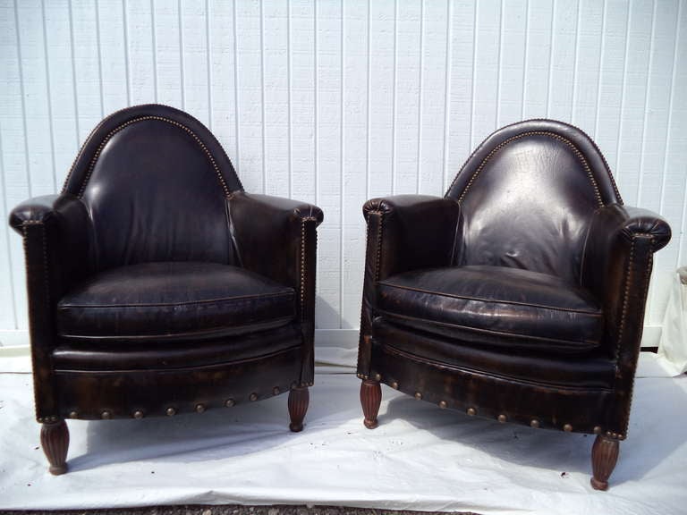 Gorgeous pair of chocolate leather and brass studded club chairs by the high end company Bradington Young.
