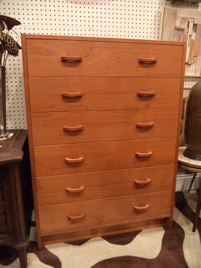 Danish Teak Highboy Dresser signed Mobler. Clean, simple lines make up this classic dresser. Drawers have a white Formica type laminate lining.