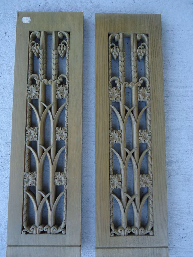 Thick hand carved Oak panels of flowers, buds and stems .