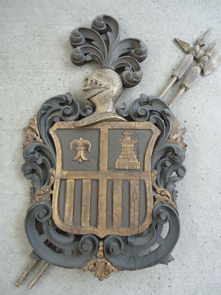 French wooden hand-carved Coat of Arms crest. Silver and gold gilded wood with knight's helmet.