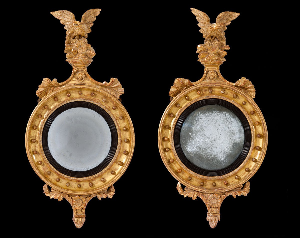 Pair of Regency Period Carved Giltwood Convex Mirrors