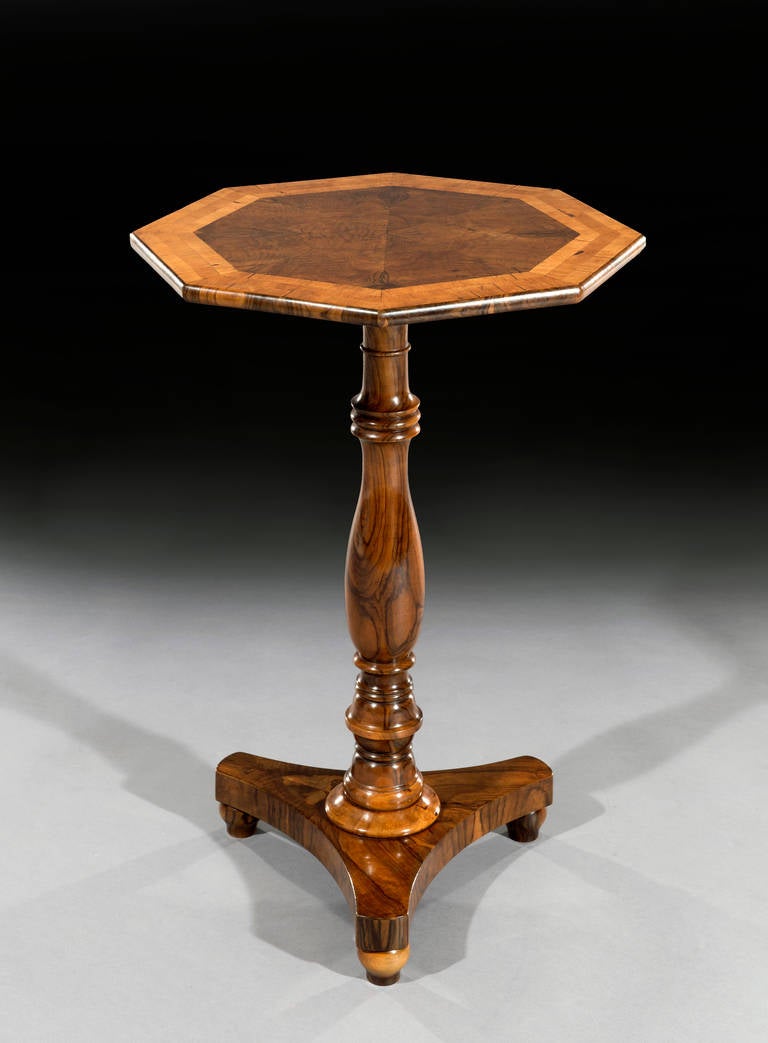 Rare William IV Olivewood Octagonal Occasional Table signed by J Nutter of Bradford Yorkshire.

The table has stunning olivewood veneers to the centre of the table, cross banded with maple, silky oak and sycamore bandings with olive veneers to the