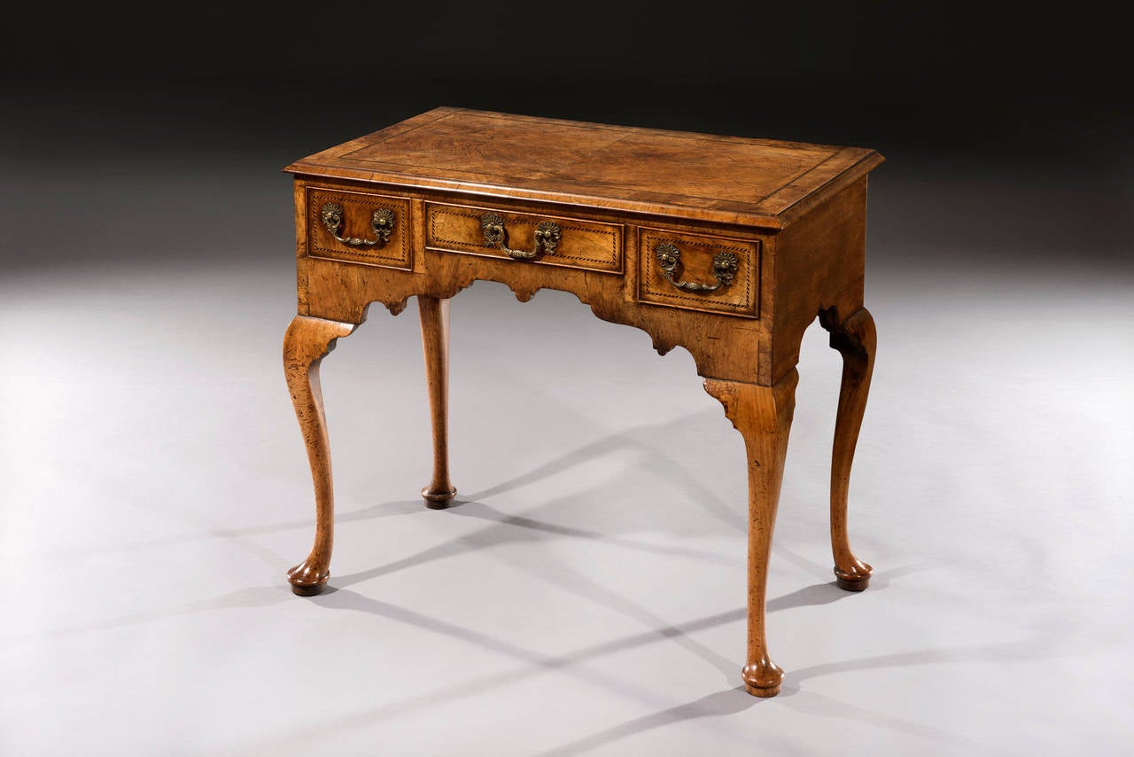 George II Walnut Lowboy with Cabriole Legs and Pad Feet