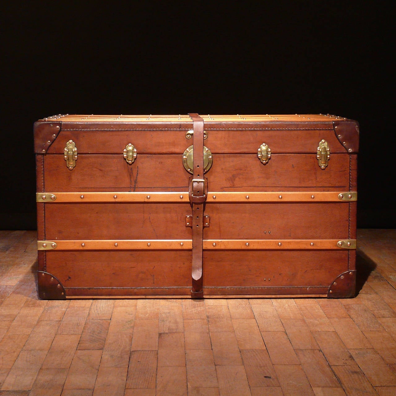 A marvellous leather covered trunk with brass fittings, original leather strap and original interior, by Hofmann of Karlsbad when it was part of the Austro-Hungarian Empire, circa 1895. The trunk is of exceptional quality; in the realms of Louis