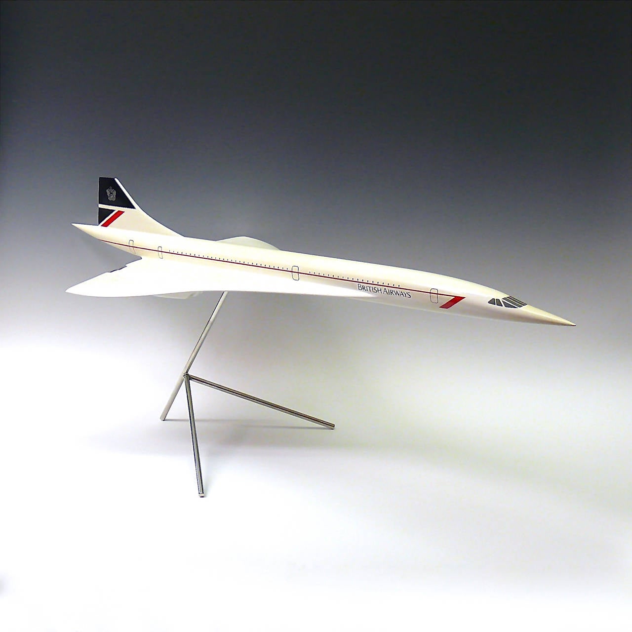 An original vintage Concorde fiberglass and plastic composite 1:72 scale model. In full British Airways livery, mounted on metal stand,
circa 1985.

Dimensions: 85 cm (length) x 35 cm (wing span) x 36 cm (height on stand to top of tail