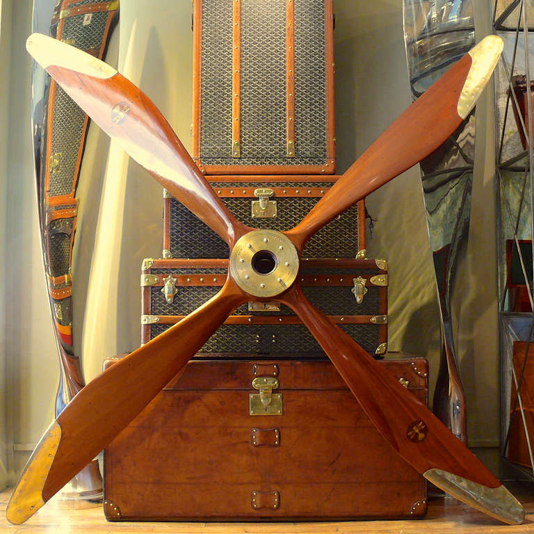 A particularly fine mahogany propeller. The proportion and scale is particularly good and four blade examples have become difficult to find.
It was made by the workshops of Ruston (one of the largest British builders of aero-engines and aircraft