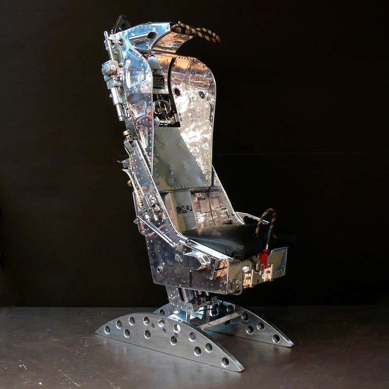 A Martin Baker ejection seat from a Sea Vixen jet, stripped and polished to a mirror finish and fixed to a custom made base. The Sea Vixen was a successful British two seat jet fighter in service from the 1950’s to the 1970’s. It operated in its