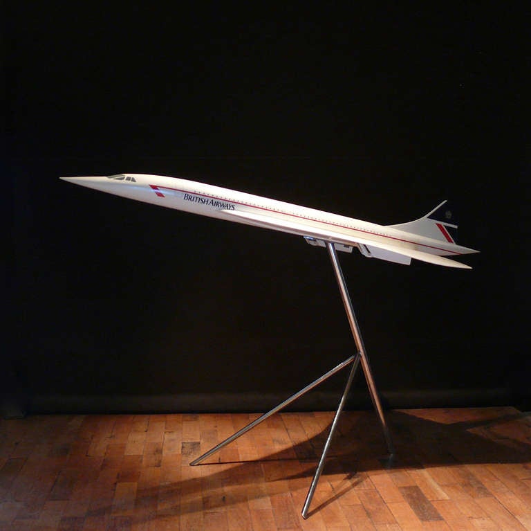 A splendid vintage fibreglass and plastic composite aircraft model of a Concorde in full British Airways livery mounted on original chrome plated stand, circa 1990, made by Space Models Ltd. This 1:36 scale aircraft model of Concorde was presented