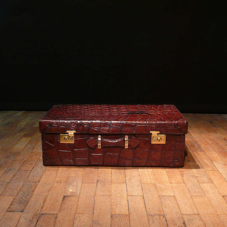 A magnificent large scale antique crocodile skin suitcase/trunk with relined interior. Circa 1900.

Dimensions: 77.5 cm (length) x 46 cm (depth) x 26 cm (height)

This item is covered by CITES regulations.

Bentleys are Members of LAPADA, the London