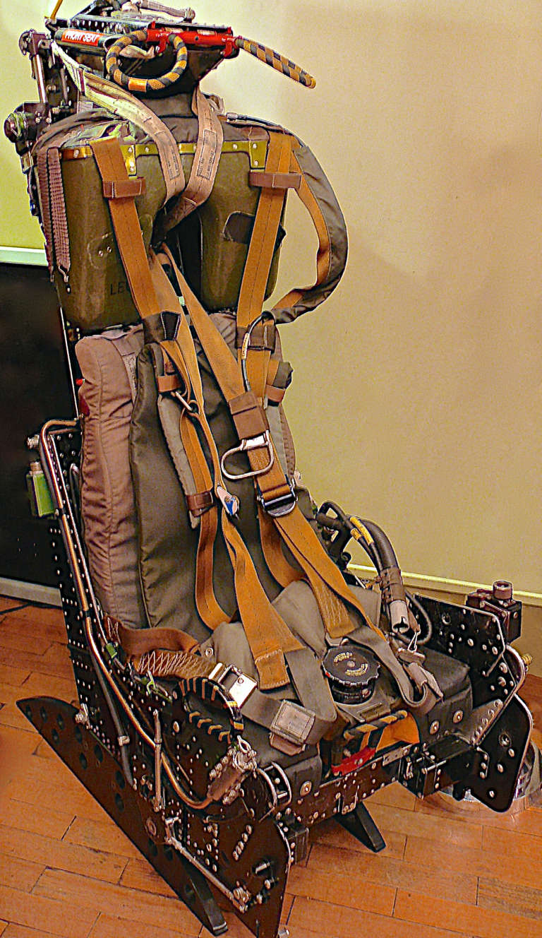 A Martin Baker ejection seat from a McDonnell Douglas F-4 Phantom in original black and green finish with full harness and pilots parachute. Manufactured between 1958 and 1981 the Phantom is one of the most successful and long lived modern military