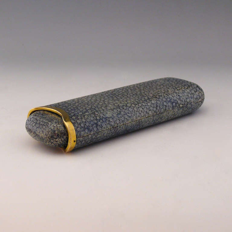 A stunning shagreen cigar case with 9 carat gold collar hallmarked London 1924.

Dimensions: 15.5 cm x 5 cm x 2.5 cm.

Bentleys are Members of LAPADA, the London and Provincial Antique Dealers Association

All prices are net VAT for export outside