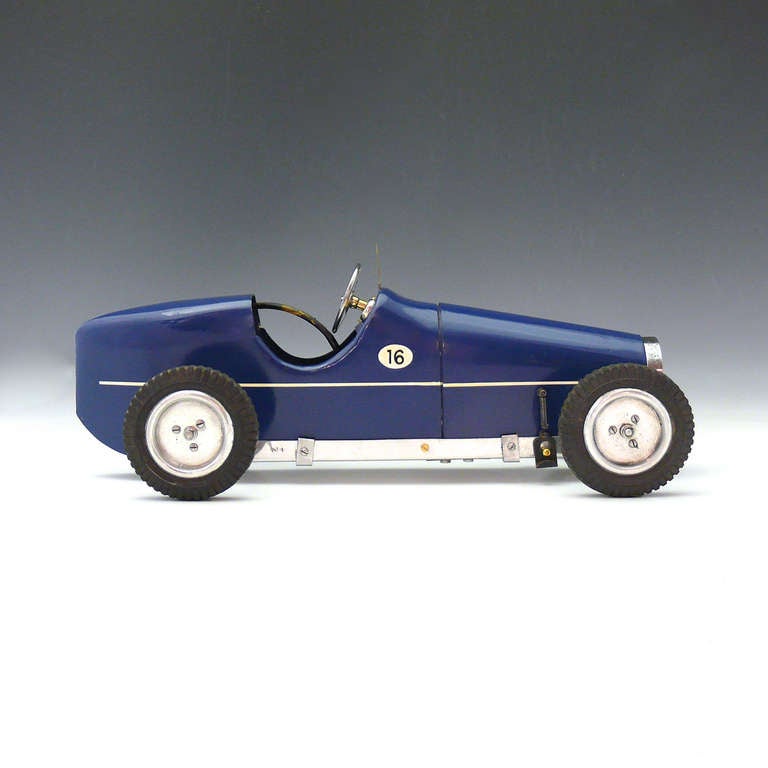 The Wasp was a tether car model produced by M&E Models of Exmouth with a C-class capacity engine and 'Bugatti style' bodywork. This particular model is in excellent condition with the original engine and is deeply reminiscent of the heyday of the
