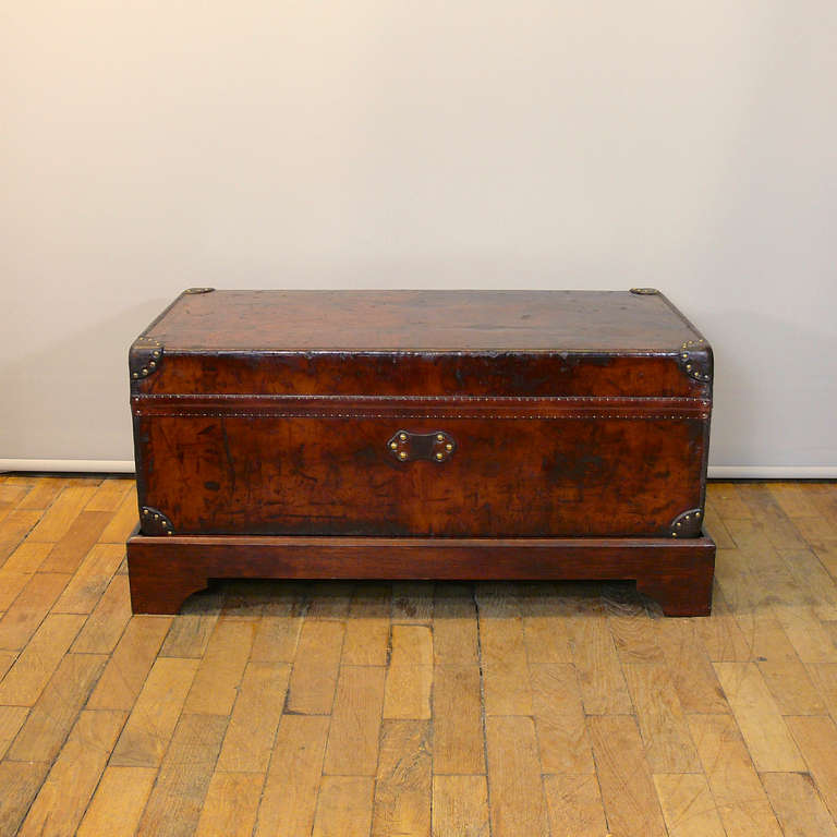 A wonderfully proportioned Louis Vuitton Leather Cabin Trunk, circa 1895with an attractive patina to the leather and re-lined in cotton to match the original interior. We have had a custom-made stand made for the trunk to sit on which makes it a