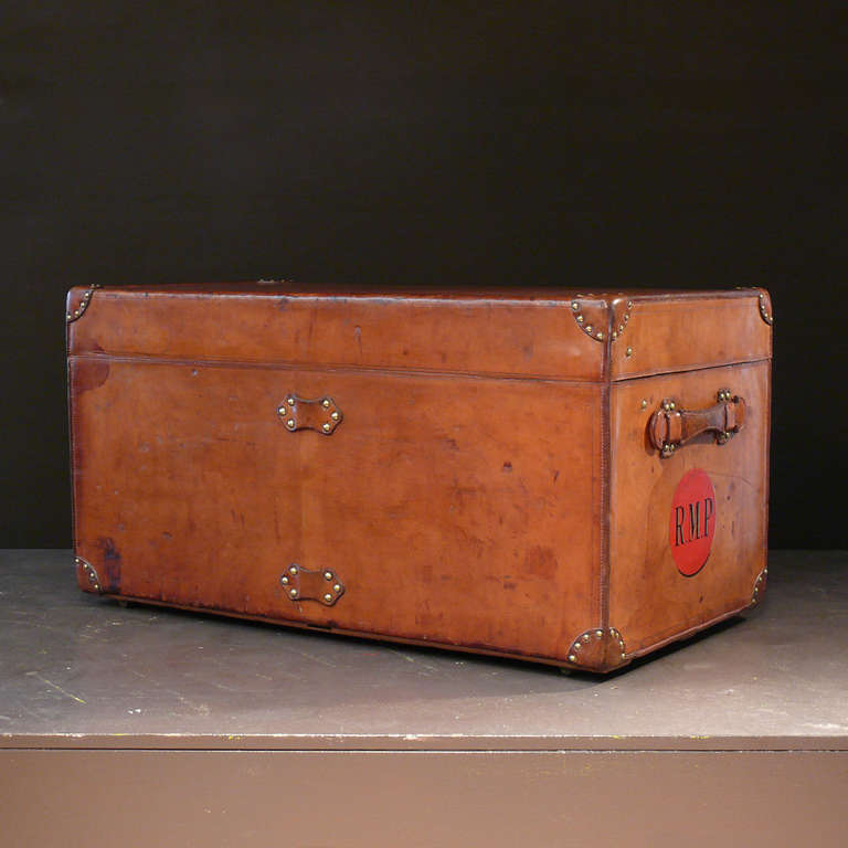 A wonderful leather covered Louis Vuitton trunk in terrific condition and with a wonderful, warm, honey color. Complete with both original interior trays, circa 1900. An exceptional example of museum quality.

Dimensions: 91 cm (length) x 50 cm