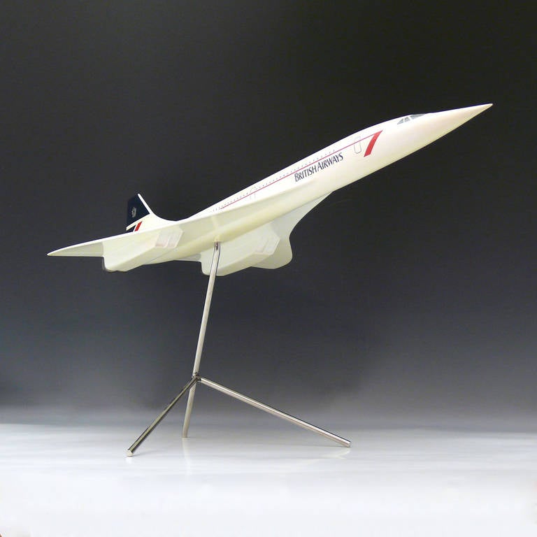 A vintage Concorde fiberglass and plastic composite model. In full 1980s British Airways livery, mounted on metal stand.
circa 1985.

Dimensions: 33½ inches or 85 cm (length) x 14¼ inches or 36 cm (wing span) x 35.5 cm or 14 inches (height on