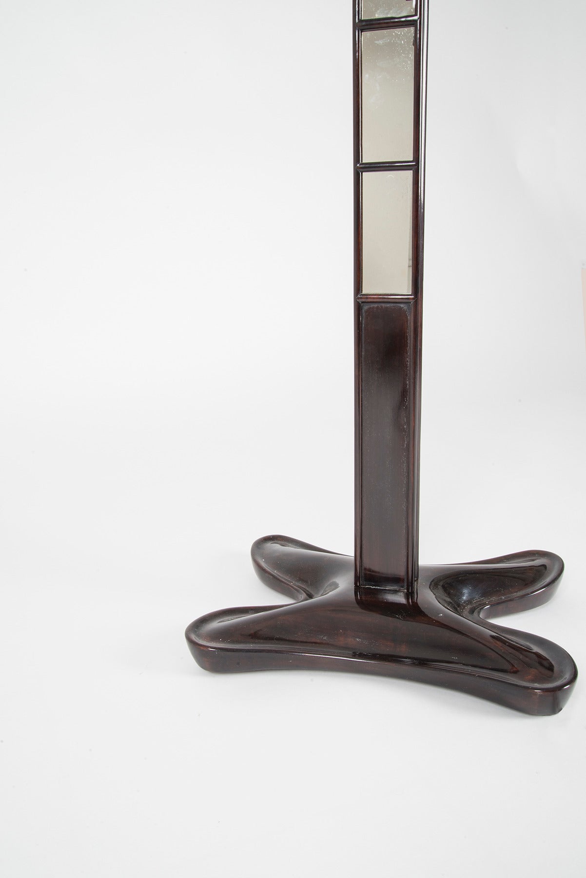 Floor lamp in the style of Cesare Lacca's works, manufactured in Italy in 1945 (approximately). Lacquered wooden structure with mirror glass tiles, brass shade with switch.