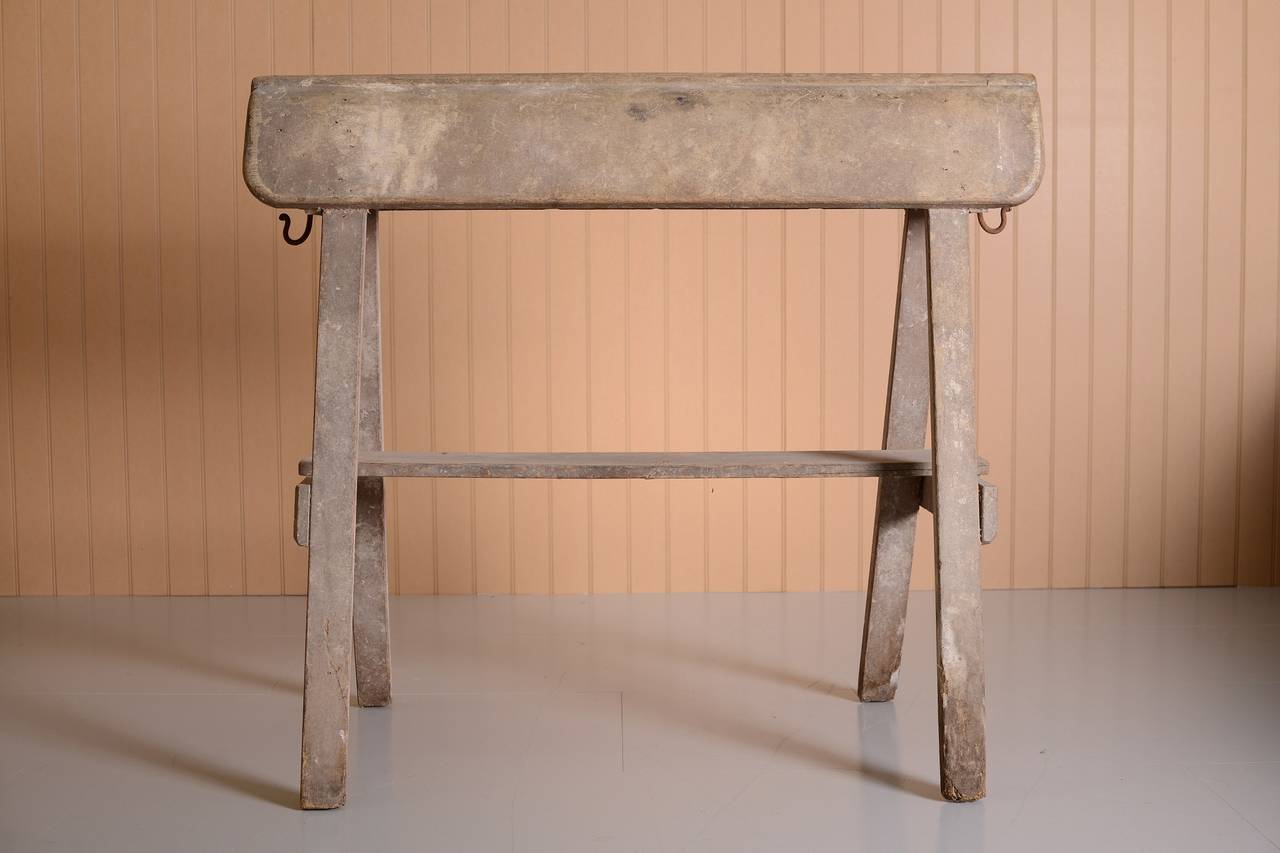 Georgian Antique Painted Pine Saddle Horse.
This is a fabulous, early 19th century antique pine saddle horse in the original lovely white/grey paint finish.
A simple design, estate made for a country house tack room, with an iron hook at each end,