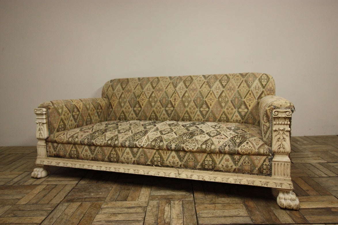 Fabulous English Antique Deep Seated Sofa.
This is a great, large and ample sized Edwardian antique sofa, climb on in!
The bleached oak frame is very architectural with hairy lions paw feet and columns above.
A carved and shaped apron along the