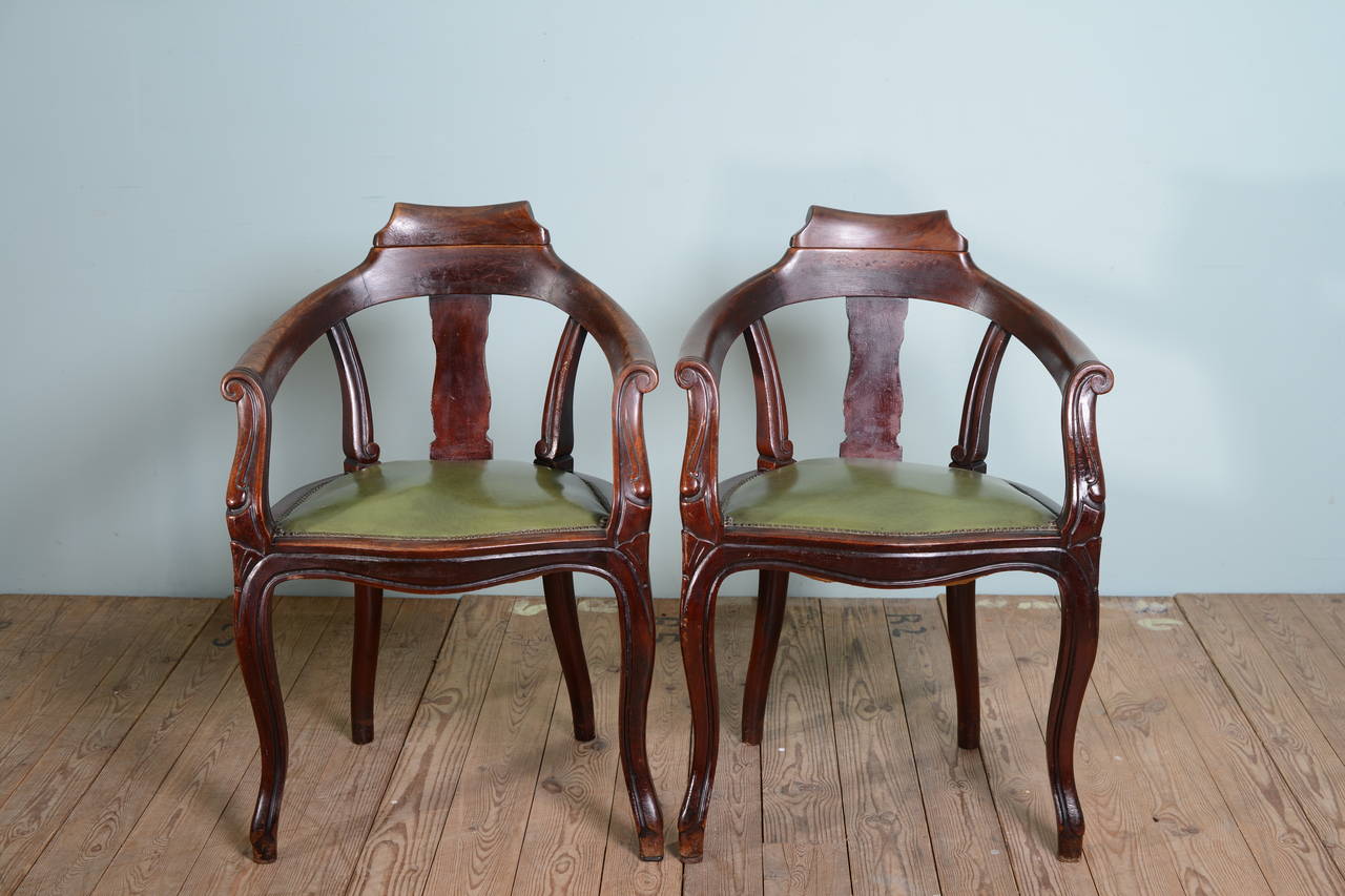 Pair of Antique Parisian Barber's Chairs