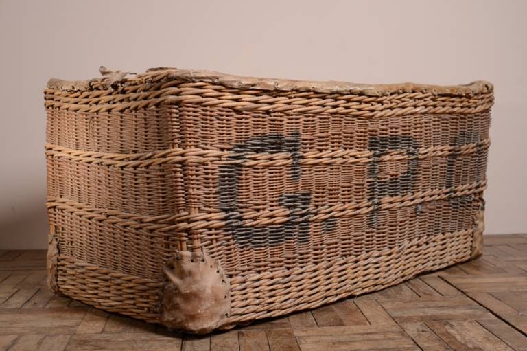 Huge Edwardian Antique Postal Wicker Basket.
This is a massive English antique general post office wicker basket.
Complete with the original GPO lettering and the vellum covered top edge and matching corners.
In very good condition, imagine how