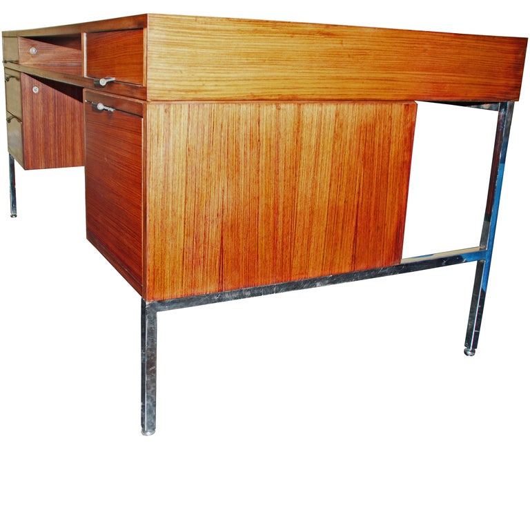 Joseph-André Motte
Rosewood veneered desk with  chrome plated steel base 
Dassas edition  1962