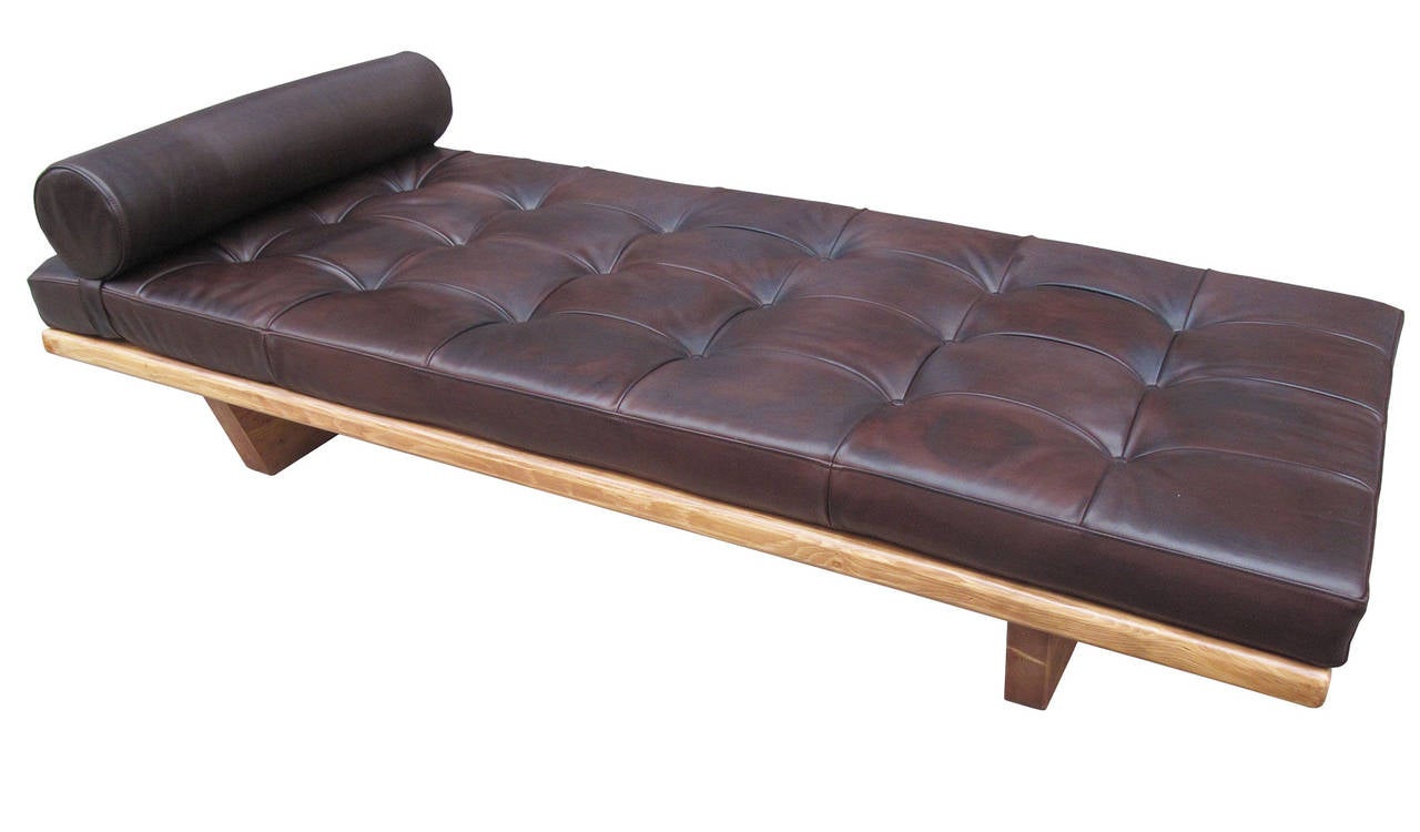 Charlotte Perriand daybed from Meribel les Allues Alp ski resort,
In pine and leather seat.
