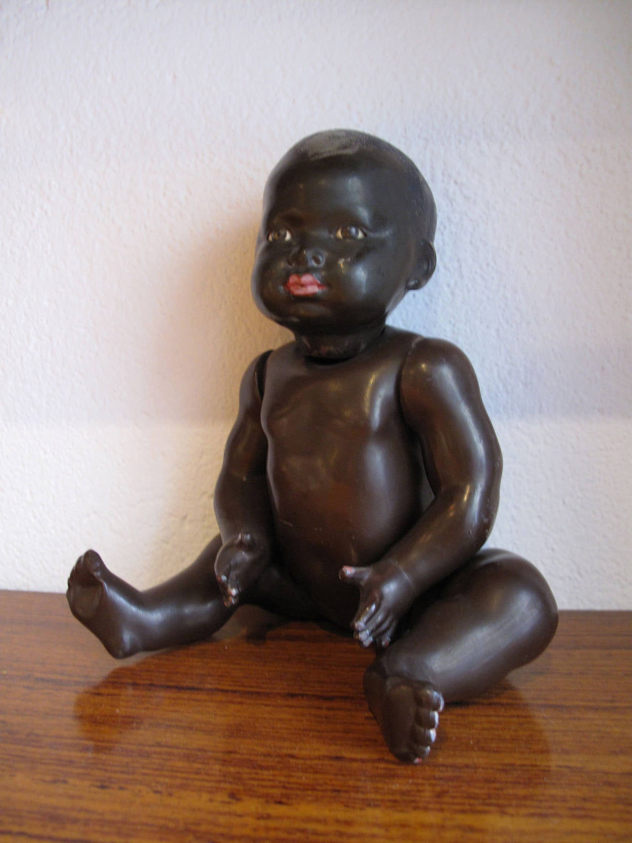 Vintage 1950s little black early plastic celluloid doll
 p.84 'Poupées et Bébés en celluloïde' d'E. Chauveau.