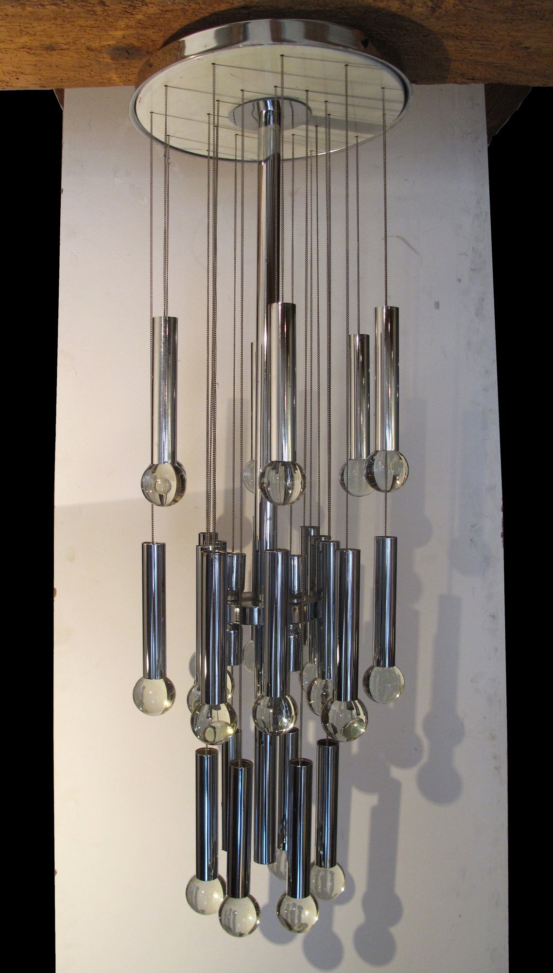 Gaetano Sciolari Chandelier

Materials and Techniques:	Chrome, Glass
Condition:	Excellent
Wear:	Wear consistent with age and use
Height:	44 in. (112 cm)
Diameter:	15 in. (38 cm)
