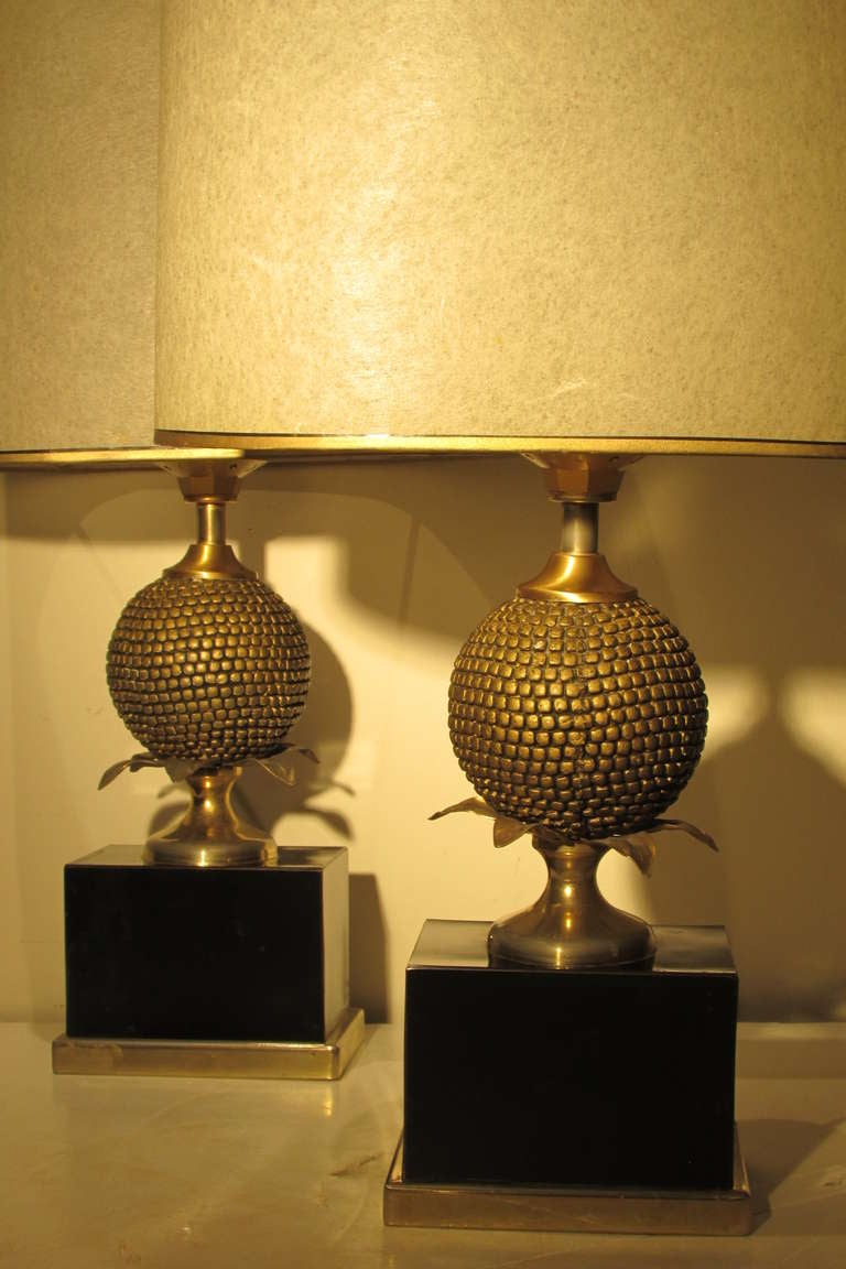 Pair of pomegranate form French table lamps by Maison Charles / Jacques Charles.  They retain the original period shades & the European wiring w/ switch on electric cords & round pronged plugs.