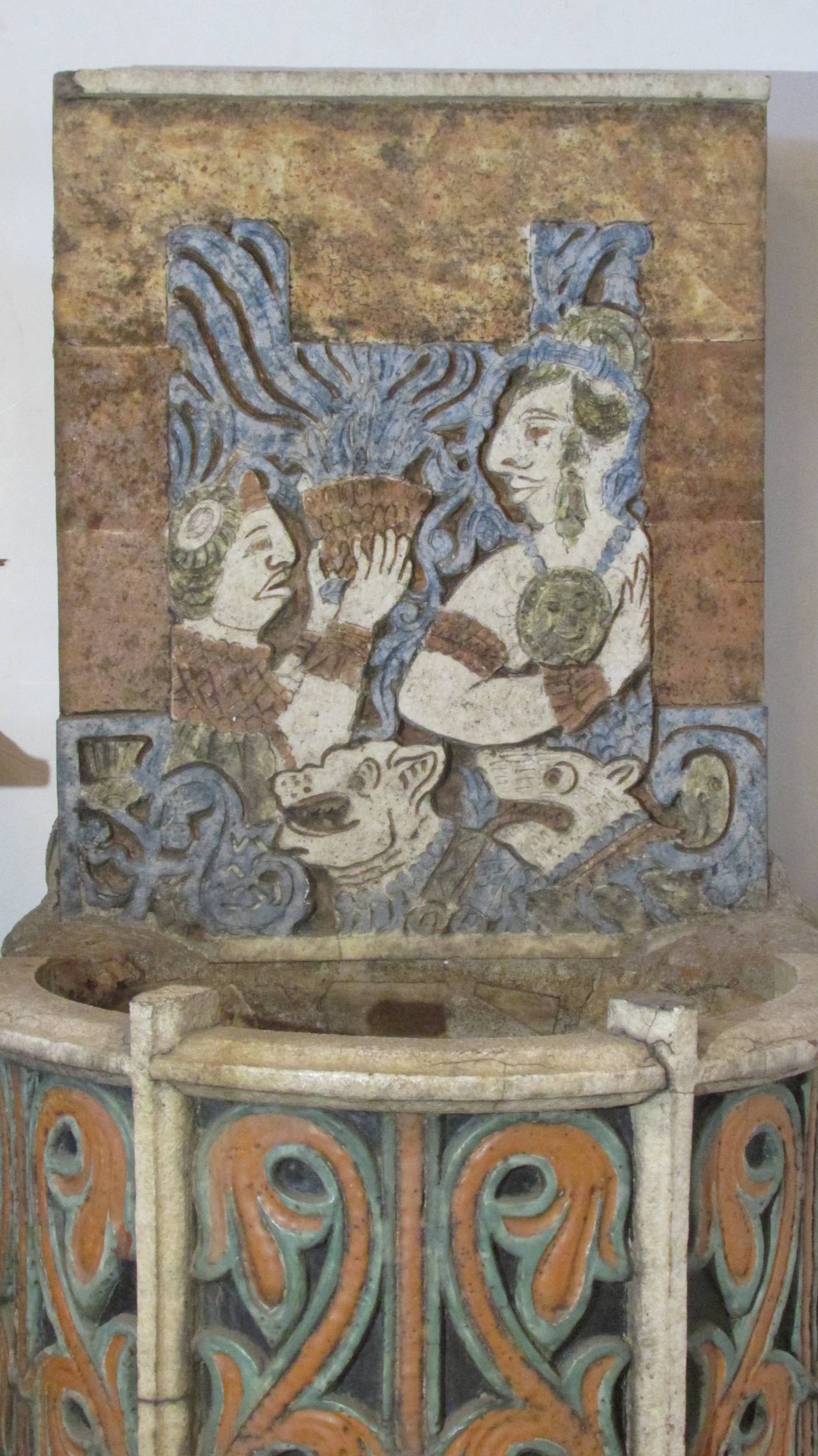 A rare antique polychrome glazed terracotta relief tile wall niche font basin fountain with Spanish Mexican Aztec Mayan figures dog's gods - direct from a Western NY family and purchased in the early 20th century at an estate liquidation auction.