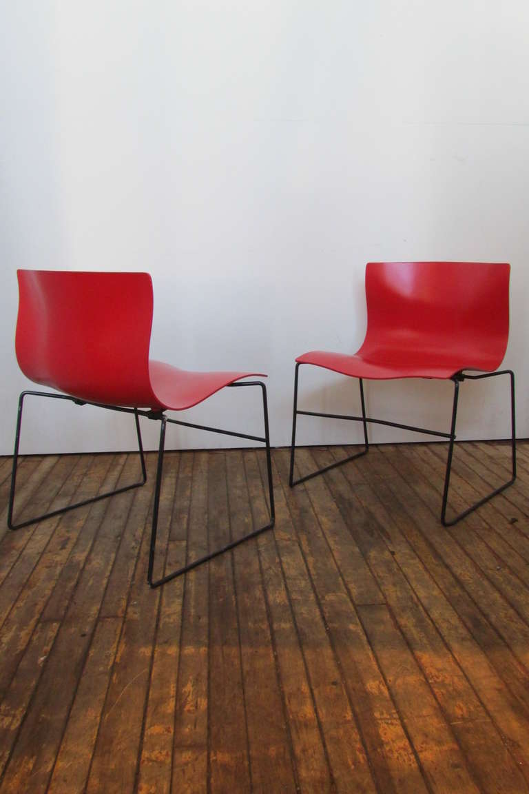 A set of four vintage red stacking handkerchief chairs by Massimo & Lella Vignelli for Knoll Studio - 1985. All with the impressed mark & original labels present.