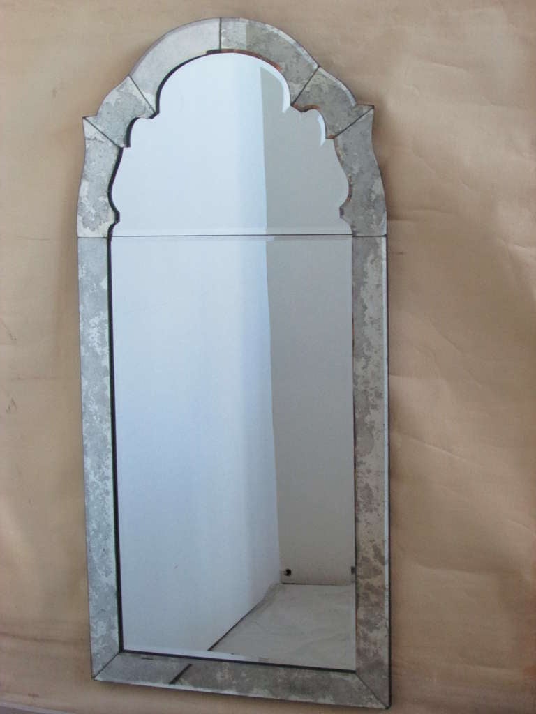 Tall mid 20th century Italian Venetian shaped arched top framed mirror with beautifully aged smoked oxidation to all outside beveled mirror sections.The large interior mirror is a split panel - this is not evident in our main photo-shopped image (