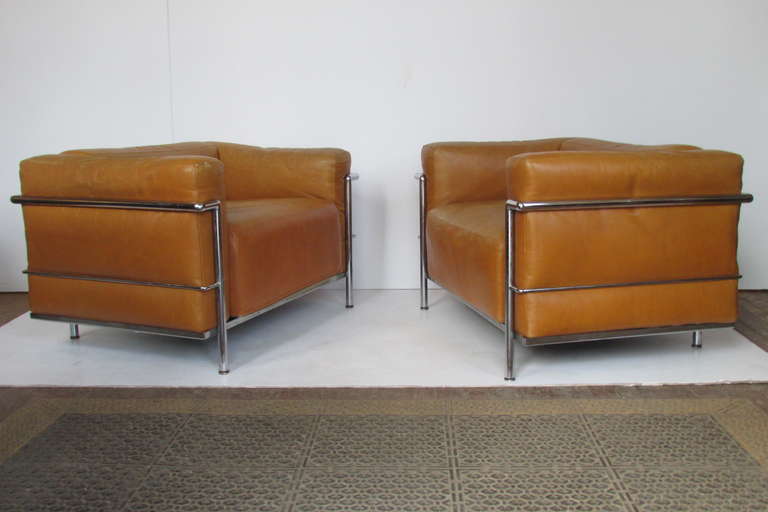 A pair of LC3 Grand Confort Armchairs. The original Bauhaus period chairs dating from 1928 designed by Le Corbusier in collaboration w/ Pierre Jeanneret & Charlotte Perriand. This pair from the original blueprints, manufactured with the exclusive