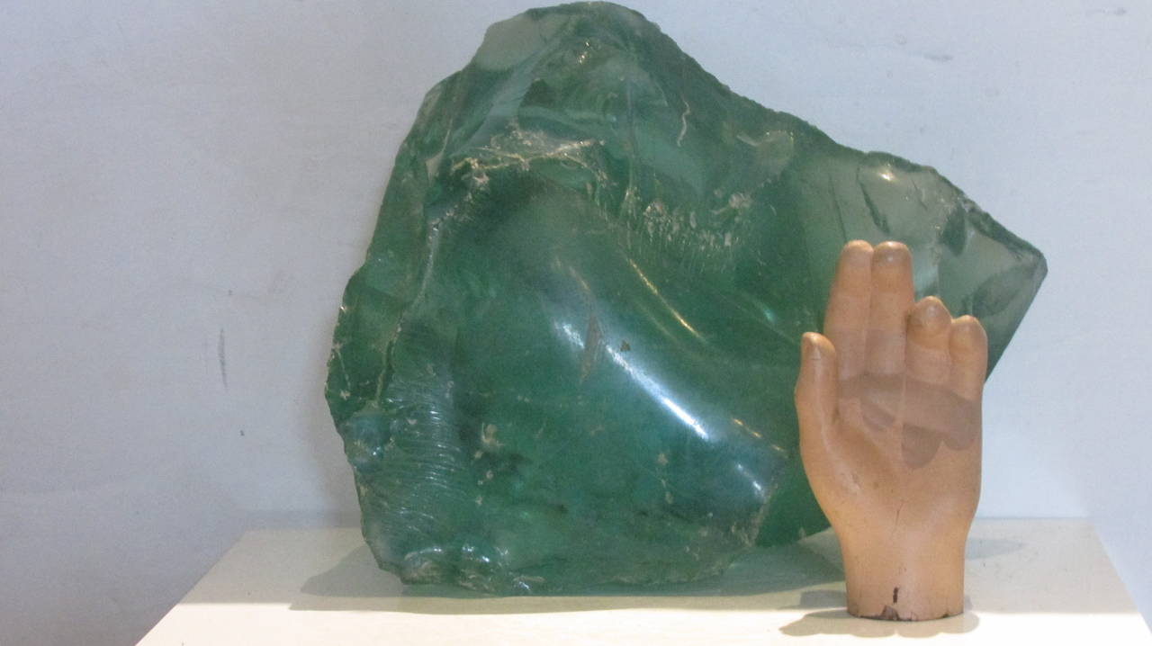 Two large free form transparent sea foam green glass cullet chunks as found from an old closed Ford Motor Plant in Michigan - circa 1940's - the  larger chunk measures 13 inches across x 11 inches high 9 1/2 inches deep - weighing about 25 pounds -