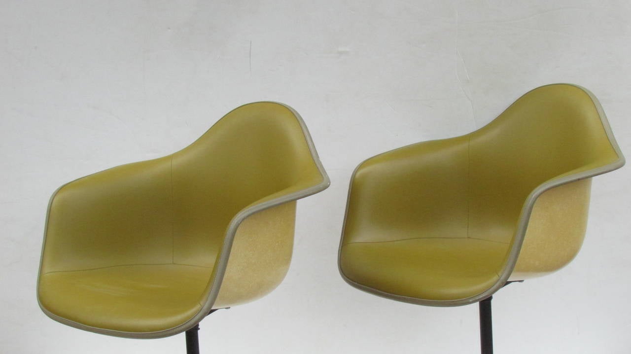 Mid-Century Modern Eames Bucket Swivel Chairs in Alexander Girard Olive Chartreuse Naugahyde