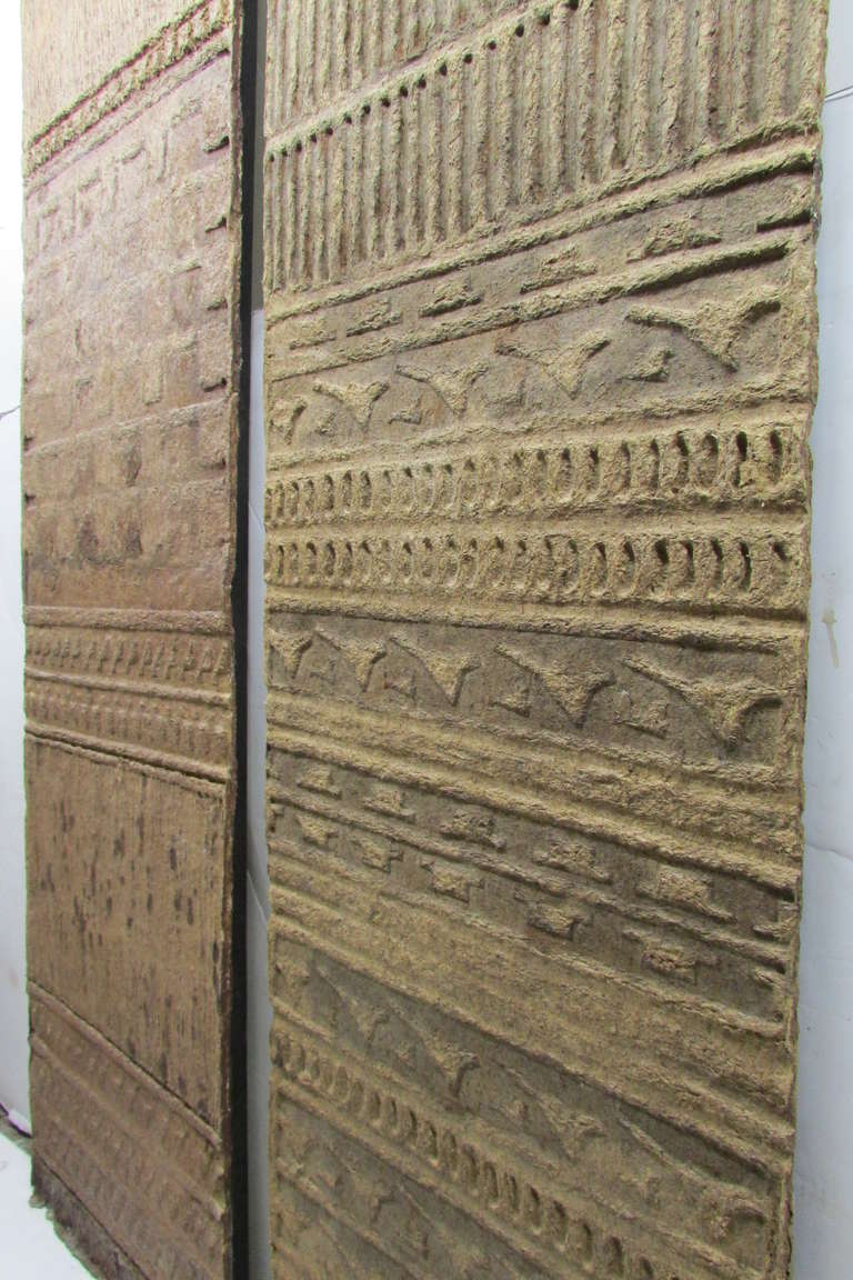Two hand sculpted brutalist style tall panels constructed from an emulsified pulp of rag paper / natural plant fiber / fabric on wood framed canvas by American studio artist Kay Stowell who exhibited her works at a number of New York City galleries