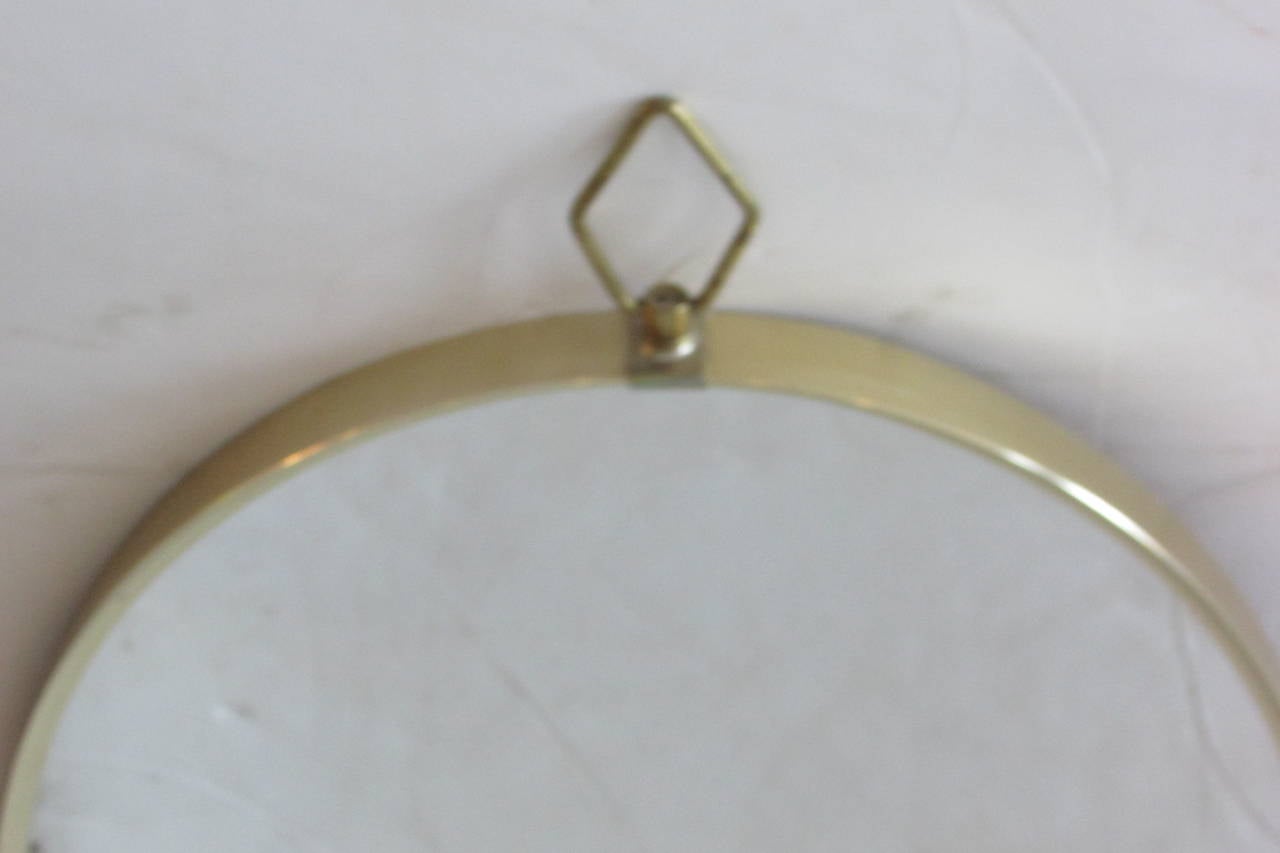 1960s Modernist Oval Brass Mirror In Excellent Condition In Rochester, NY