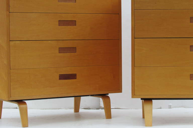 By Clifford Pascoe, a very rare pair of Minimalist designed four drawer birch dressers with recessed spring action drawer pulls. Both chests with original glowing finish.