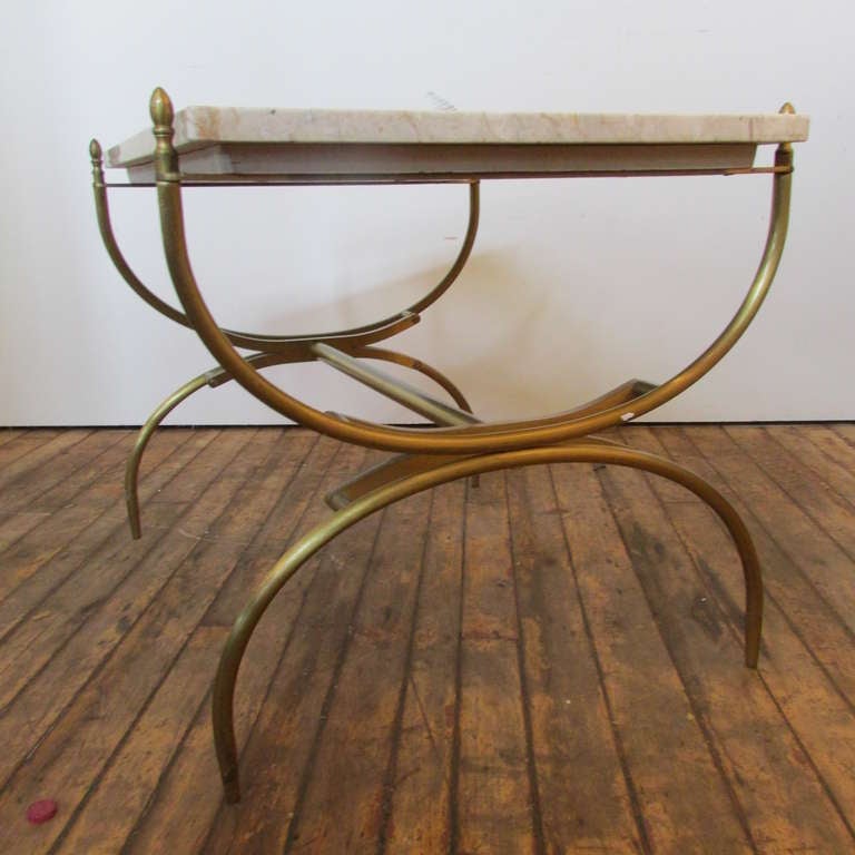 Pair of 1960's Italian Modernist lacquered gold brass / bronze & travertine marble curule form tables with sleek tapered legs in the style of Gio Ponti. Beautifully aged patina color to metal. Exceptional quality.  Note ***** The marble tops which