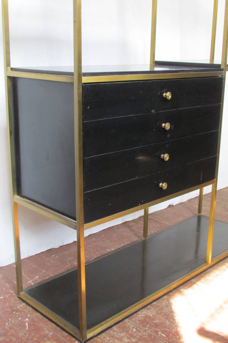 brass and wood bookcase