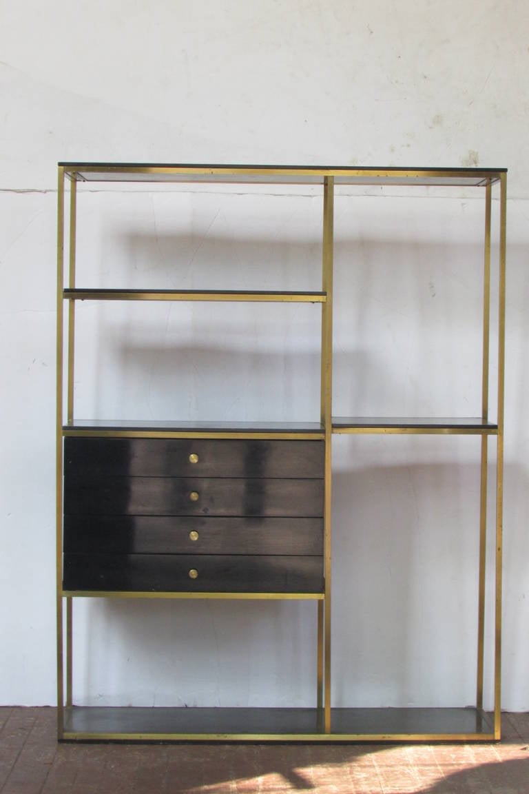 brass and wood shelves