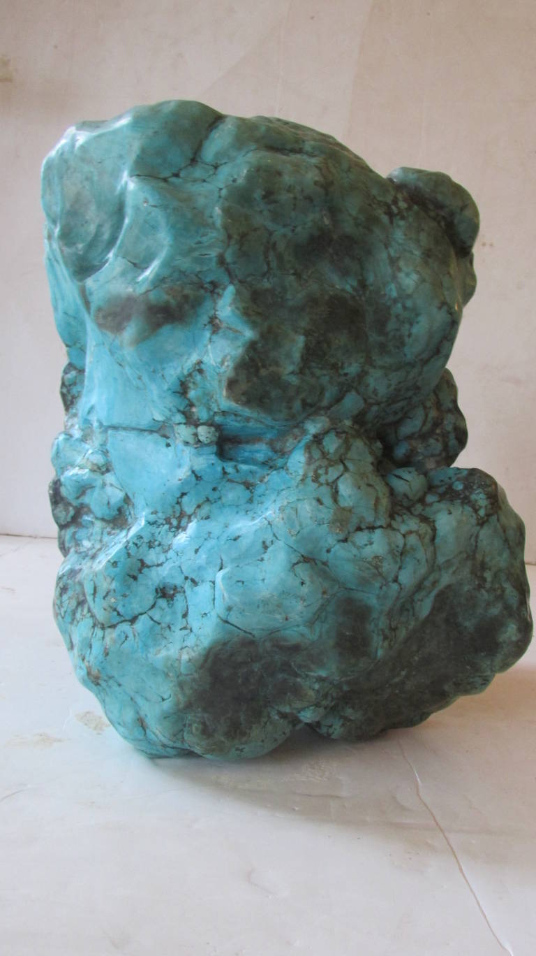 A Howlite ( Magnesite ) natural mineral specimen of voluminous size and weighing approximately 100 - 120 pounds. This mineral is dyed to resemble turquoise and is called Turquenite. Howlite was first discovered in Windsor, Nova Scotia by Henry How