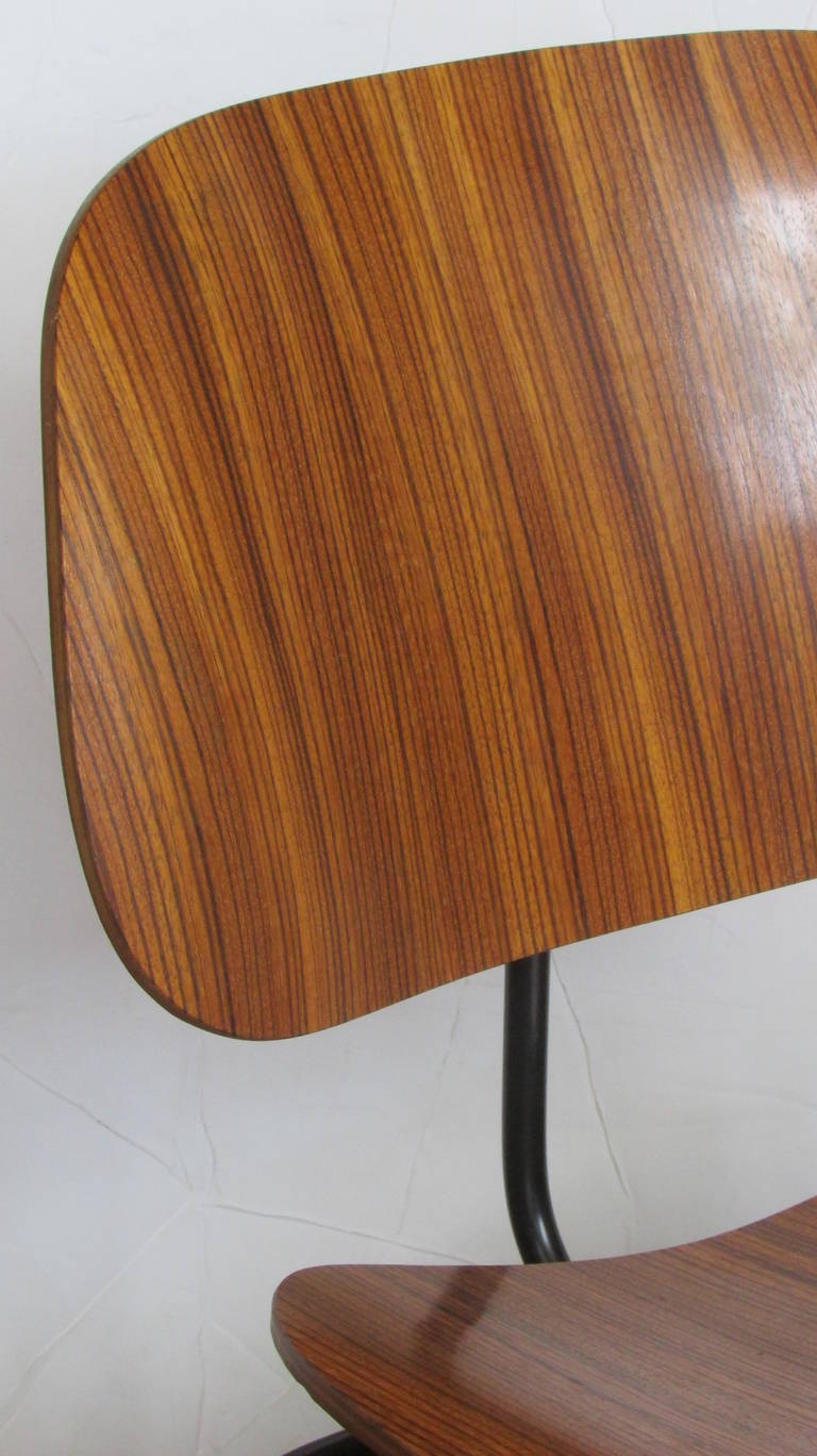 An exceptional example of an Eames LCM in rare zebra wood. Great all original glowing condition / retains Herman Miller foil label & stamping.