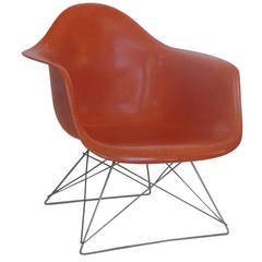 Eames Red Orange LAR Chair with Cats Cradle Base