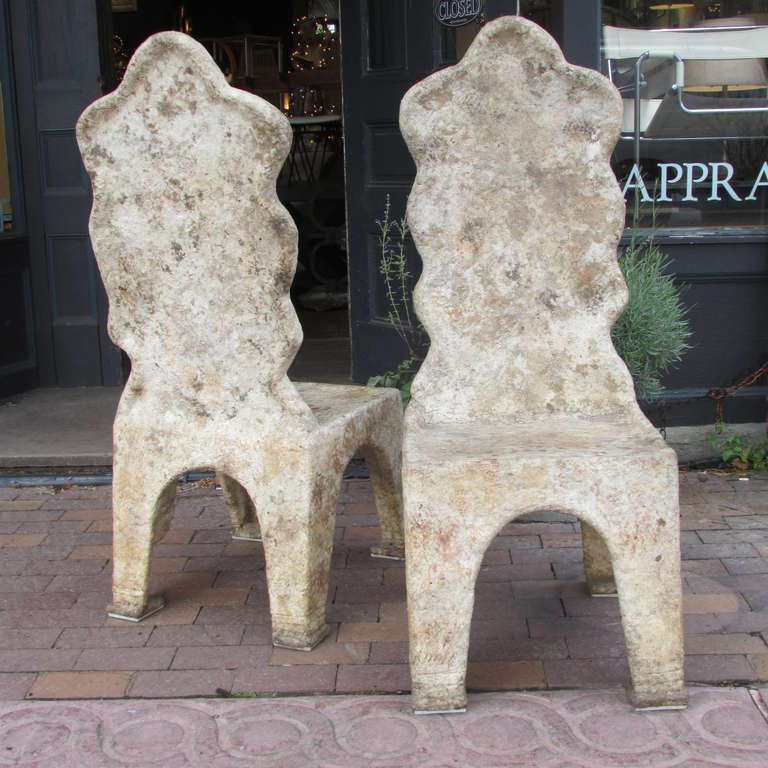 A pair of brutalist style art sculpture chairs by Rochester NY artist Kay Stowell - created from a papier mache type emulsion of natural fibrous plant matter, twigs, textile rag & paper product. These chairs have a solid dense heavy weight