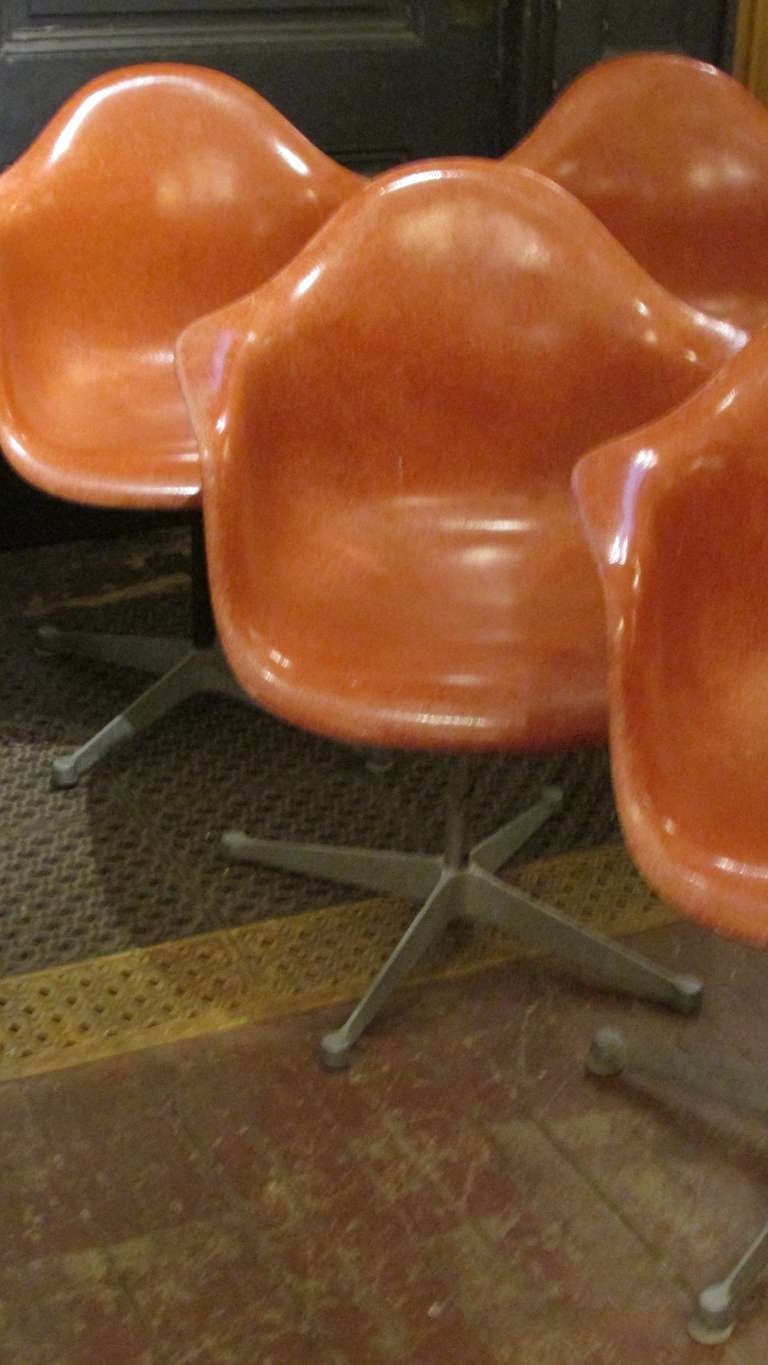 American Eames Salmon Fiberglass Swivel Chairs