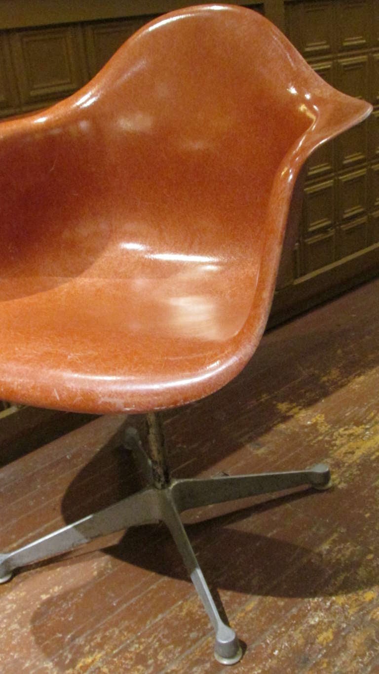 Mid-Century Modern Eames Salmon Fiberglass Swivel Chairs