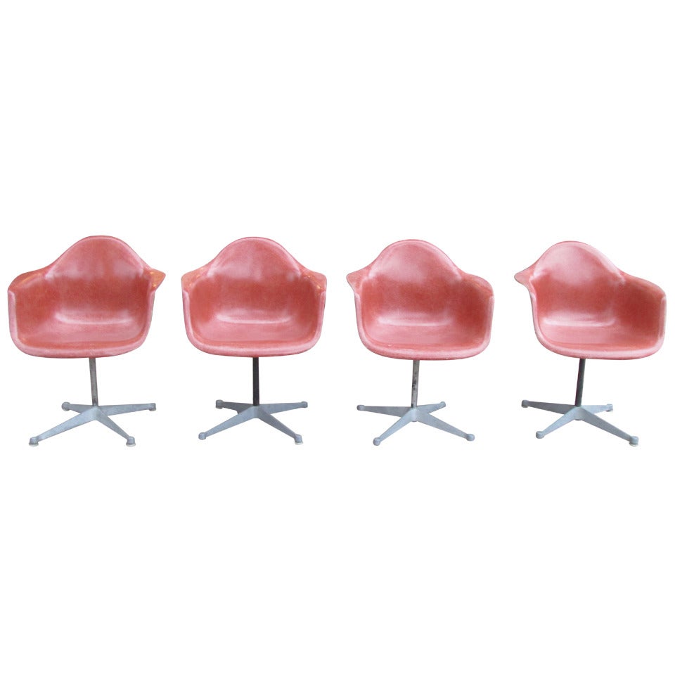 Eames Salmon Fiberglass Swivel Chairs