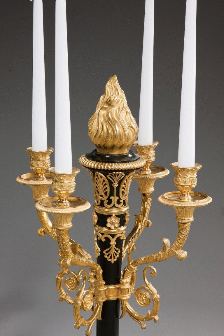 Fine pair of large French Empire style ormolu and patinated bronze candelabra of Neoclassical design. 