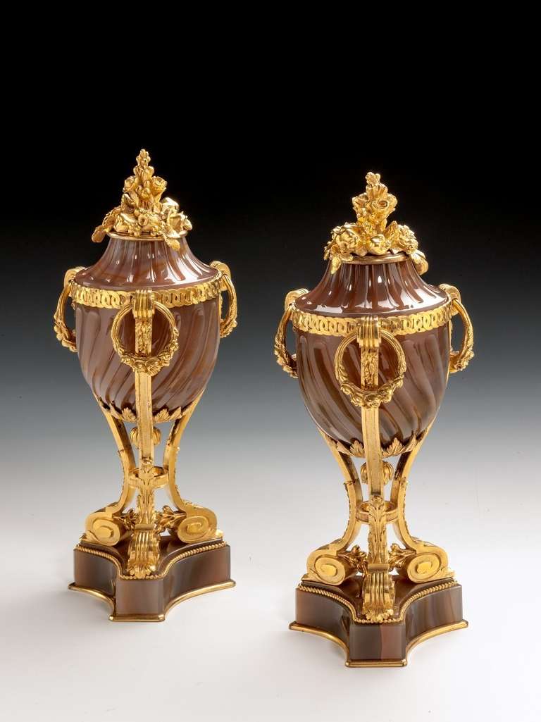 A pair of exquisite Agate and Ormulu urns, circa 1900, signed 'B V' on the underside.